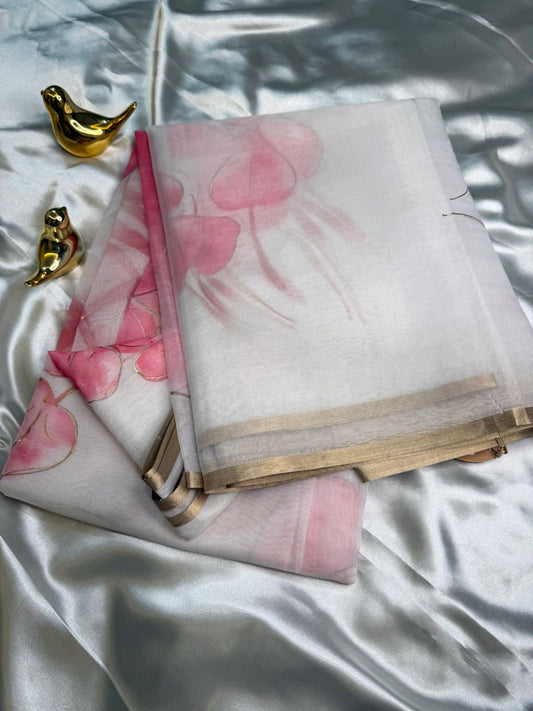 White Organza Saree with Pink Floral Motifs and Gold Border